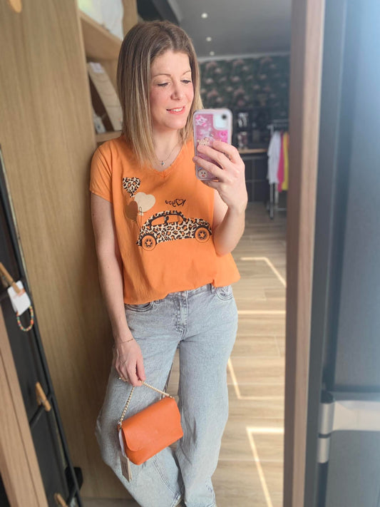 T-shirt orange à motifs léopard